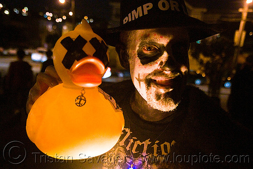 skull makeup and dead ducky - dia de los muertos - halloween (san francisco), day of the dead, dead duck, dia de los muertos, face painting, facepaint, halloween, makeup, man, night, rubber ducky