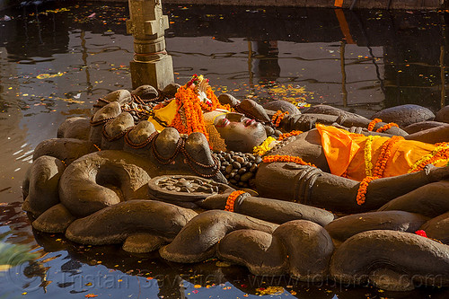 sleeping vishnu - budhanikantha temple (nepal), 11, budhanikantha temple, eleven-head, eleven-headed, floating vishnu, flower offerings, hindu temple, hinduism, jalakshayan narayan, laying down, marigold flowers, naga snake, nāga snake, pond, pool, sculpture, sleeping vishnu, statue