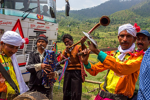 small indian marching band playing at a village wedding, bagpipe, dancing, drum, headdress, indian wedding, marching band, men, musicians, playing music, sword, tola gunth, turban