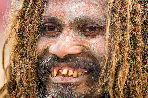 smiling sadhu with bad teeth, baba, bad teeth, beard, dreadlocks, hindu pilgrimage, hinduism, holy ash, kumbh mela, man, sacred ash, sadhu, vibhuti