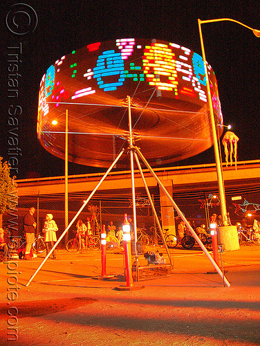 spinning art installation with led lights, art installation, fire art, led lights