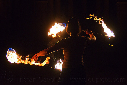 spinning double fire staff, backlight, double staff, fire dancer, fire dancing, fire performer, fire spinning, fire staffs, fire staves, night, savanna, spinning fire, woman