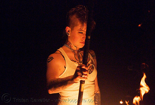 spinning fire staff (san francisco) - fire dancer - leah, double staff, fire dancer, fire dancing, fire performer, fire spinning, fire staffs, fire staves, leah, night, spinning fire, tattooed, tattoos, woman