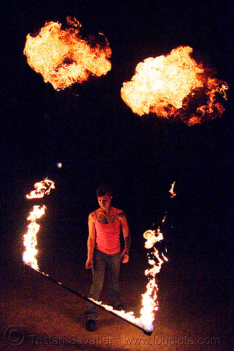 spinning fire staff (san francisco) - fire dancer - leah, fire dancer, fire dancing, fire performer, fire spinning, fire staff, leah, night, spinning fire, tattooed, tattoos, woman