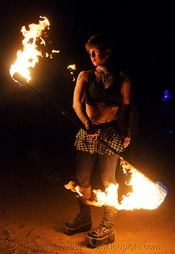 spinning fire staff (san francisco) - fire dancer - leah, fire dancer, fire dancing, fire performer, fire spinning, fire staffs, fire staves, leah, night, spinning fire, tattooed, tattoos, woman