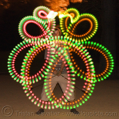 spinning led light poi - glowing - flowlight, fire dancer, fire dancing, fire performer, fire spinning, glowing, led lights, led poi, led staff, light poi, loops, man, nicky evers, night, spinning fire, vertical symmetry