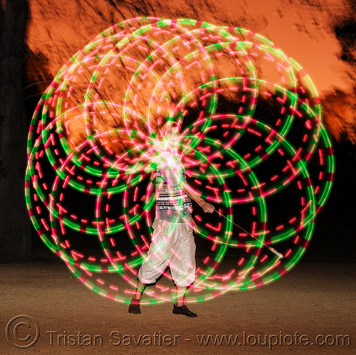 spinning led light poi - rosace - glowing - flowlight, fire dancer, fire dancing, fire performer, fire spinning, glowing, led lights, led poi, light poi, man, nicky evers, night, rosace, spinning fire