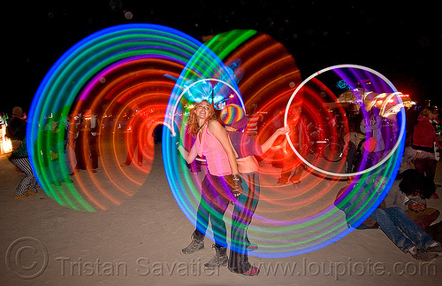 spinning light hulahoops - burning man 2010, burning man, hooping, hula hoops, kaylyn, led hula, light hulas, night, woman