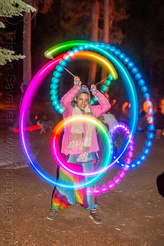 spinning light morphing led poi, glowing, led lights, led poi, light poi, night, paegasus flameheart, star camp, woman