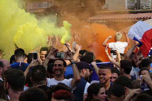 spontaneous street celebration of france winning soccer world championship - finale coupe du monde de football 2018 - supporters (paris), allez les bleus, bleu blanc rouge, coupe du monde de football 2018, crowd, dancing, fifa, french flags, on a gagné, orange smoke, place de la contrescarpe, smoke bombs, soccer world cup 2018, street party