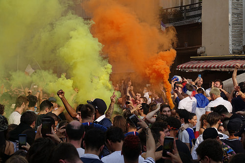 spontaneous street celebration of france winning soccer world championship - finale coupe du monde de football 2018 - supporters (paris), allez les bleus, bleu blanc rouge, coupe du monde de football 2018, crowd, dancing, fifa, french flags, on a gagné, orange smoke, place de la contrescarpe, smoke bombs, soccer world cup 2018, street party