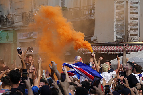 spontaneous street celebration of france winning soccer world championship - finale coupe du monde de football 2018 - supporters (paris), allez les bleus, bleu blanc rouge, coupe du monde de football 2018, crowd, dancing, fifa, french flags, on a gagné, orange smoke, place de la contrescarpe, smoke bombs, soccer world cup 2018, street party