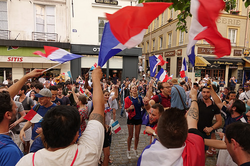 spontaneous street celebration of france winning soccer world championship - finale coupe du monde de football 2018 - supporters (paris), allez les bleus, bleu blanc rouge, coupe du monde de football 2018, crowd, dancing, fifa, french flags, on a gagné, place de la contrescarpe, soccer world cup 2018, street party