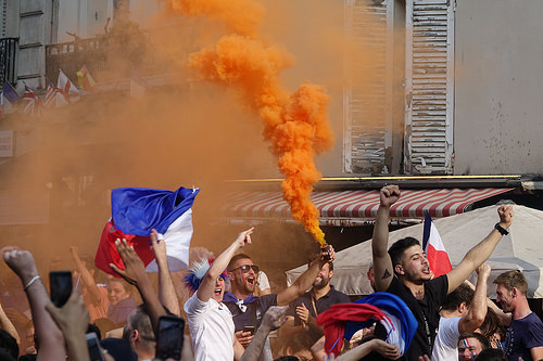 spontaneous street celebration of france winning soccer world championship - finale coupe du monde de football 2018 - supporters (paris), allez les bleus, bleu blanc rouge, coupe du monde de football 2018, crowd, dancing, fifa, french flags, on a gagné, orange smoke, place de la contrescarpe, smoke bombs, soccer world cup 2018, street party