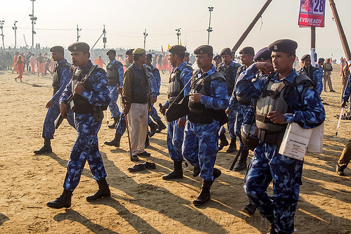 squad of indian army commando at kumbh mela (india), ak-47, akm, armed, army, assault weapons, automatic weapons, bulletproof vests, commando, crowd control, fatigues, hindu pilgrimage, hinduism, insas rifles, kumbh maha snan, kumbh mela, law enforcement, mauni amavasya, men, military, police, soldiers, squad, triveni sangam, troops, uniform, walking