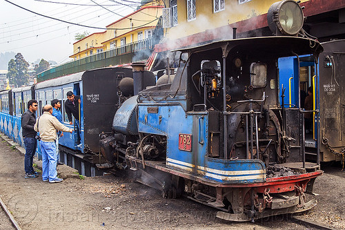 steam locomotive coupling to passenger train - darjeeling station (india), 782 mountaineer, darjeeling himalayan railway, darjeeling toy train, men, narrow gauge, railroad, smoke, smoking, steam engine, steam locomotive, steam train engine, train cars, train station