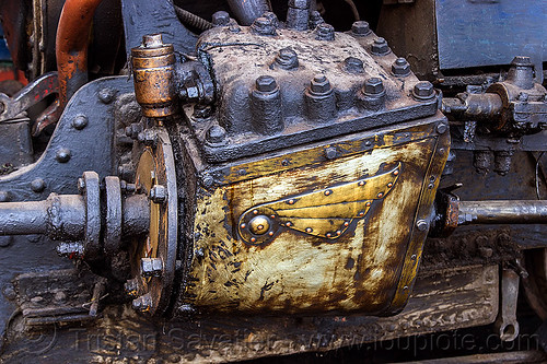 steam locomotive cylinder case with wing decoration - darjeeling (india), 802 victor, cylinder, darjeeling himalayan railway, darjeeling toy train, narrow gauge, piston, railroad, rivets, steam engine, steam locomotive, steam train engine