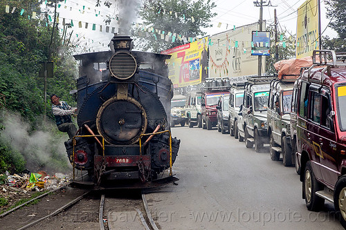 steam locomotive sharing road with cars - darjeeling (india), 788 tusker, cars, darjeeling himalayan railway, darjeeling toy train, man, narrow gauge, operator, railroad tracks, road, smoke, smoking, steam engine, steam locomotive, steam train engine, traffic jam, worker