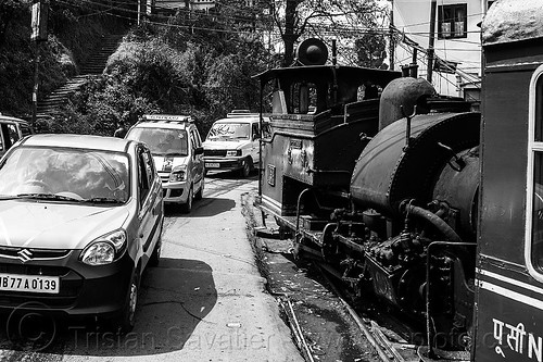 steam train sharing the road with cars - darjeeling (india), 782 mountaineer, cars, darjeeling himalayan railway, darjeeling toy train, india, narrow gauge, railroad, road, steam engine, steam locomotive, steam train engine, traffic
