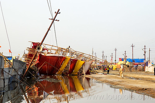 storm damage & flood - bamboo structure toppled by the wind - kumbh mela 2013 (india), ashram, bamboo structure, broken, collapsed, destruction, flood, flooded, gate, hindu pilgrimage, hinduism, kumbh mela