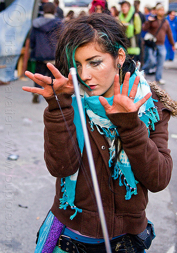 street performer with magic wand - how weird street faire (san francisco), woman