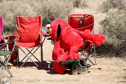 stuffed red elmo, elmo, puppet