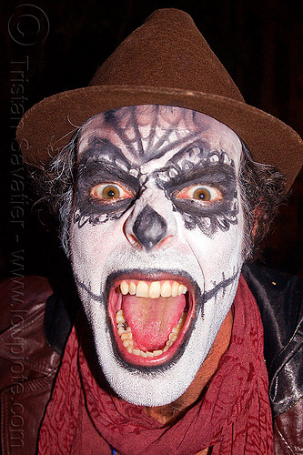 sugar skull makeup - screaming, brown hat, day of the dead, dia de los muertos, face painting, facepaint, halloween, man, mouth, night, red scarf, scream, screaming, sugar skull makeup, teeth