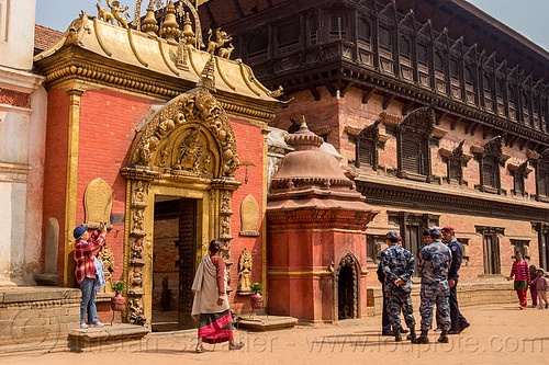 sundari chowk temple gate - bhaktapur durbar square (nepal), battledress, bhaktapur, durbar square, gate, guard, hindu temple, hinduism, military fatigues, nepalese army, soldier, uniform
