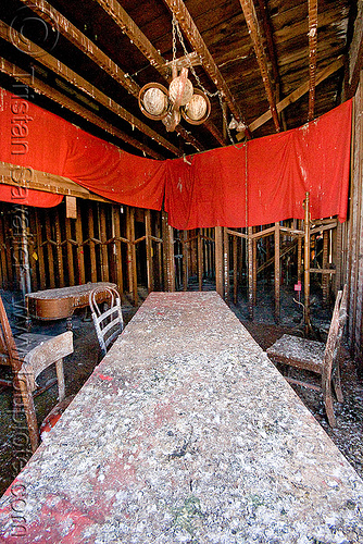 table and chairs in abandoned building, chairs, defenestration building, pigeon droppings, red, table