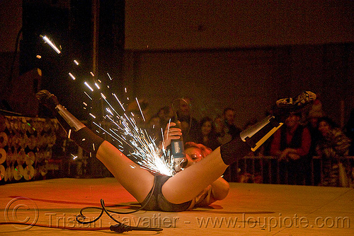 tammy firefly - burning man decompression, firefly, grinder, metal grinding, sparks, woman