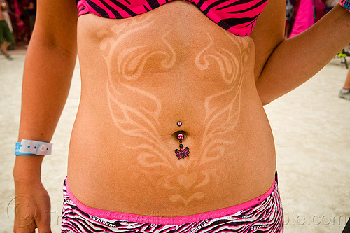 tan tattoo - burning man 2013, belly piercing, bellybutton piercing, burning man, navel piercing, tan tattoo, tanned, temporary tattoo, woman