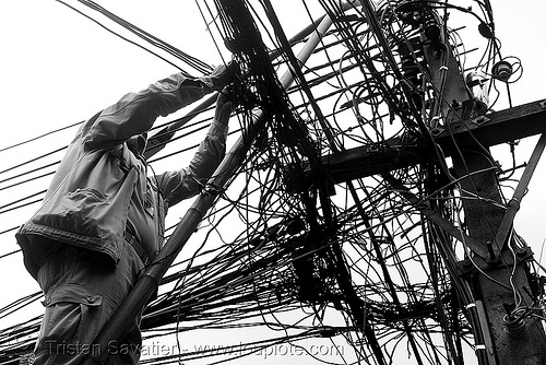 telephone pole with tangled power lines, bangkok, electric, electricity, man, phone lines, tangled, technician, telephone pole, thailand, wires, wiring, worker, บางกอก