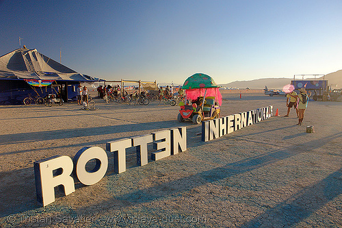 the BRC airport's name keeps changing! - burning-man 2006, black rock city airport, brc airport, burning man airport, international airport, letters, sign