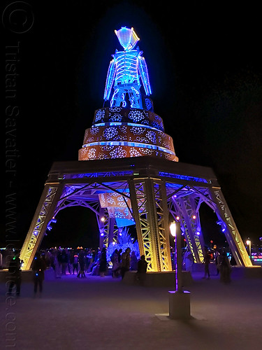 the burning man at night, burning man at night, glowing, neon, the man