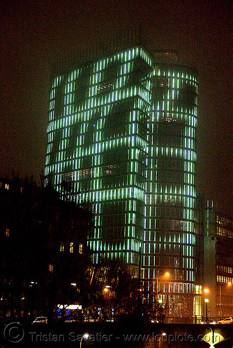 the led-light-morphing uniqa tower in vienna, building, glowing, high-rise, led lights, morphing, night, tower, twists and turns, vienna, wien