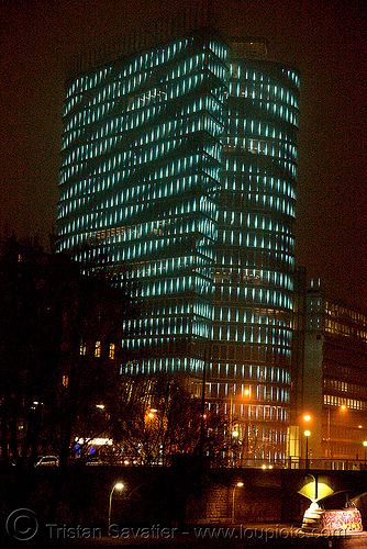 the led-light-morphing uniqa tower in vienna, building, glowing, high-rise, led lights, morphing, night, tower, twists and turns, vienna, wien