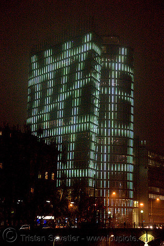 the led-light-morphing uniqa tower in vienna, building, glowing, high-rise, led lights, morphing, night, tower, twists and turns, vienna, wien