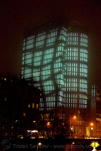 the led-light-morphing uniqa tower in vienna, building, glowing, high-rise, led lights, morphing, night, tower, twists and turns, vienna, wien