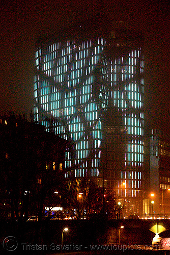 the led-light-morphing uniqa tower in vienna, building, glowing, high-rise, led lights, morphing, night, tower, twists and turns, vienna, wien