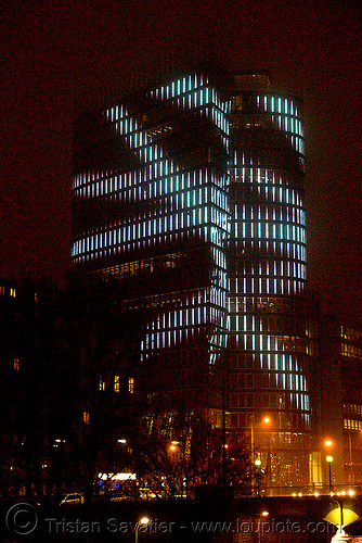 the led-light-morphing uniqa tower in vienna, building, glowing, high-rise, led lights, morphing, night, tower, twists and turns, vienna, wien