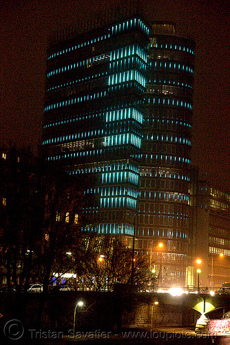 the led-light-morphing uniqa tower in vienna, building, glowing, high-rise, led lights, morphing, night, tower, twists and turns, vienna, wien