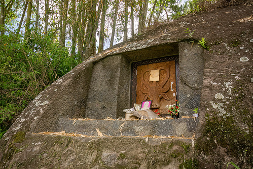 toraja rock-tomb with water buffalo head carved on door, burial site, cemetery, grave, graveyard, liang pak, pa'tedong, rock tomb, tana toraja