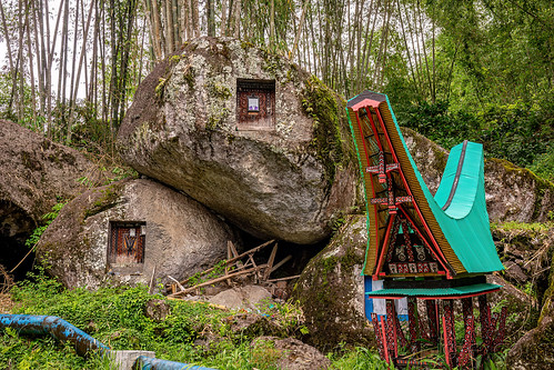 toraja rock-tombs with miniature tongkonan structure, boulder, burial site, cemetery, graves, graveyard, liang pak, miniature tongkonan, rock tombs, tana toraja, tongkonan roof