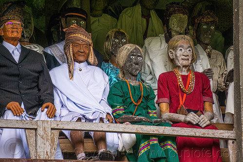 toraja tau-tau effigies of dead people in londa cave burial site, effigies, londa burial cave, tana toraja, tau-tau, wooden statues