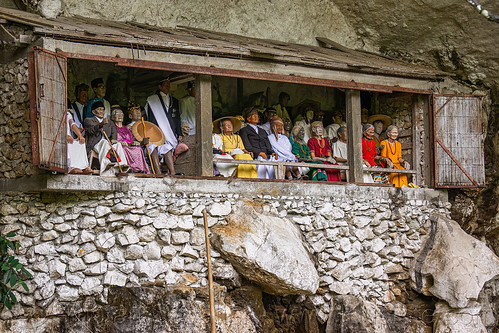 toraja tau-tau effigies of dead people in londa cave burial site, effigies, londa burial cave, tana toraja, tau-tau, wooden statues