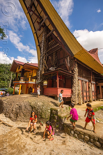 torajan kids playing in front of house adorned with water buffalo horns, boys, children, home, kids, little girls, playing, tana toraja, tongkonan house, tongkonan roof, village, water buffalo horns