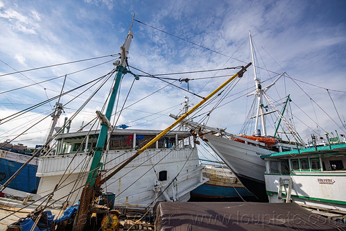 traditional pinisi boats (bugis schooners) at the makassar harbor, boats, bugis schooners, dock, harbor, makassar, pinisi, ships