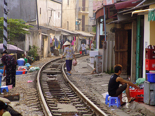 train track or street? - vietnam, curve, hanoi, houses, rail tracks, railroad tracks, railway tracks, single track, train tracks