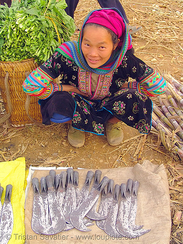 tribe woman selling billhooks at the market - vietnam, asian woman, billhooks, flower h'mong tribe, flower hmong, hill tribes, indigenous, mèo vạc, sickle