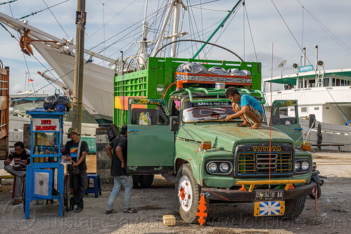 truck and traditional pinisi boat at the makassar harbor, bugis schooner, dock, harbor, makassar, men, pinisi boat, truck